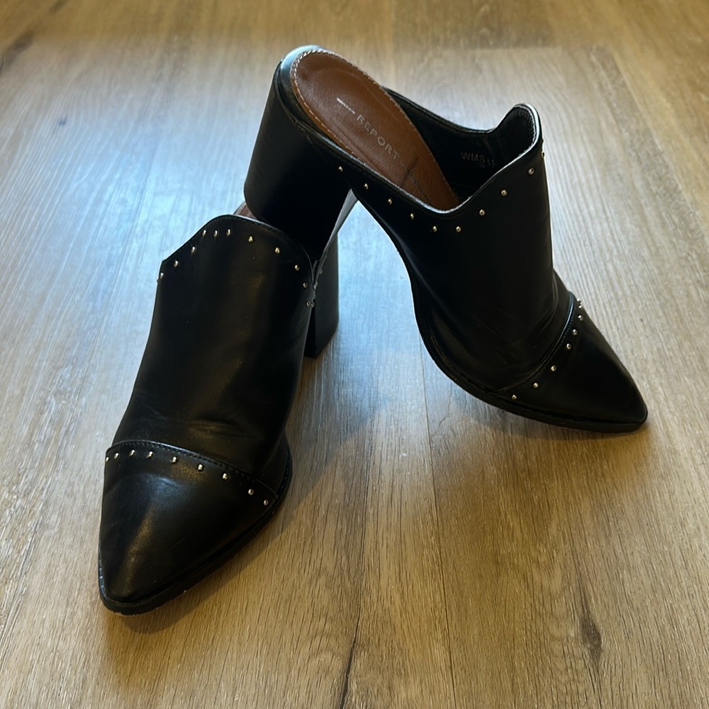 Report, black studded mules size 6.5
